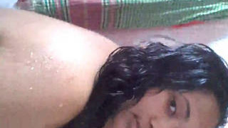 Indian girl reveals her assets while taking a bath in this hot video