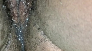 Hairy redbone gets her pussy played with and moans