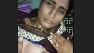 Mature Desi aunty's intimate encounter with neighbor featuring Hindi audio